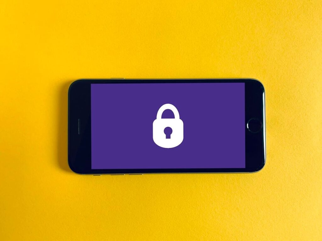 Smartphone showing a padlock icon, representing confidential results in LGBTQ+ sexual health care