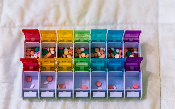 Colourful weekly pill organiser, illustrating the cost of a 28-day HIV PEP course on Koh Samui