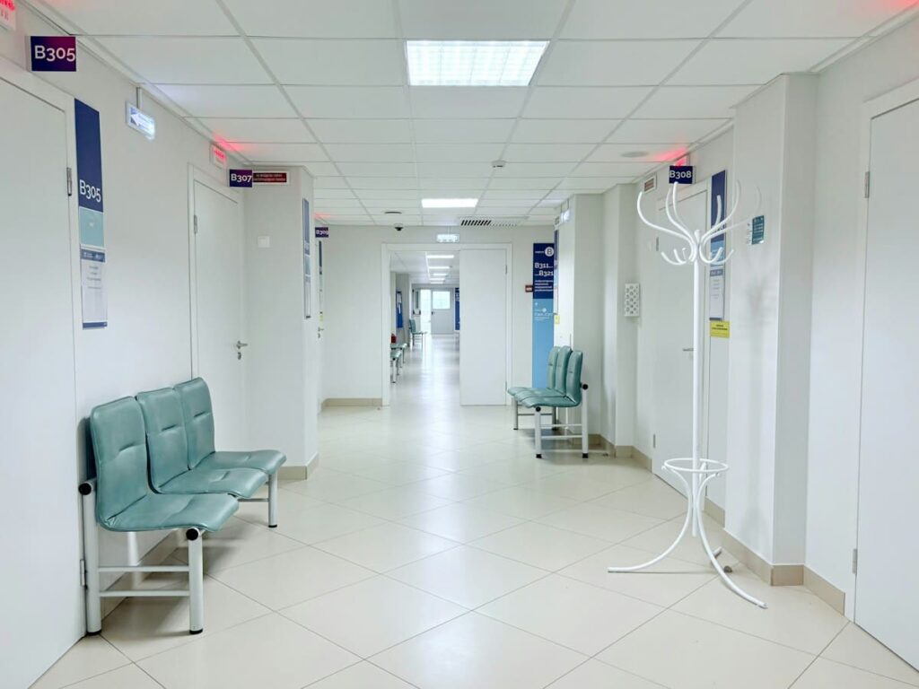 Empty hospital waiting area, comparing public hospital and private clinic options for PEP in Thailand