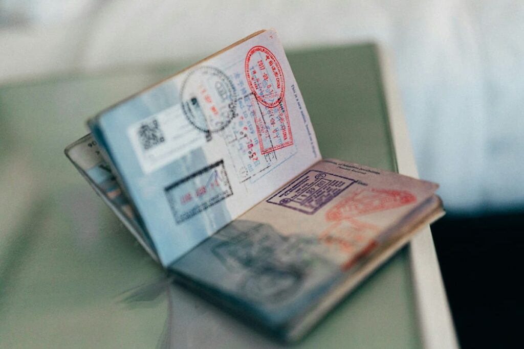 Passport and travel insurance papers, used to check whether PEP cost is covered while on Koh Samui
