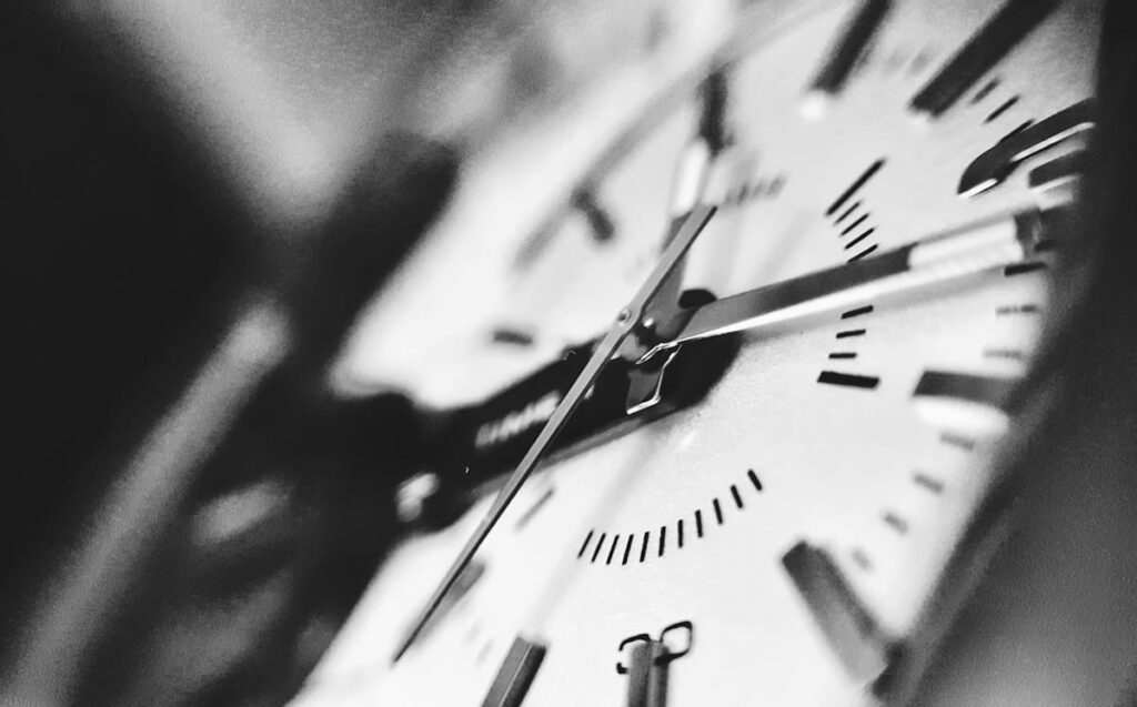 Close-up of analog clock hands, showing that PEP effectiveness depends on how many hours have passed since exposure