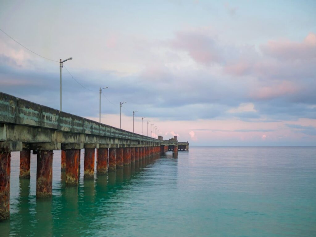 Island pier in the morning light where travellers catch a boat from Koh Phangan to Koh Samui