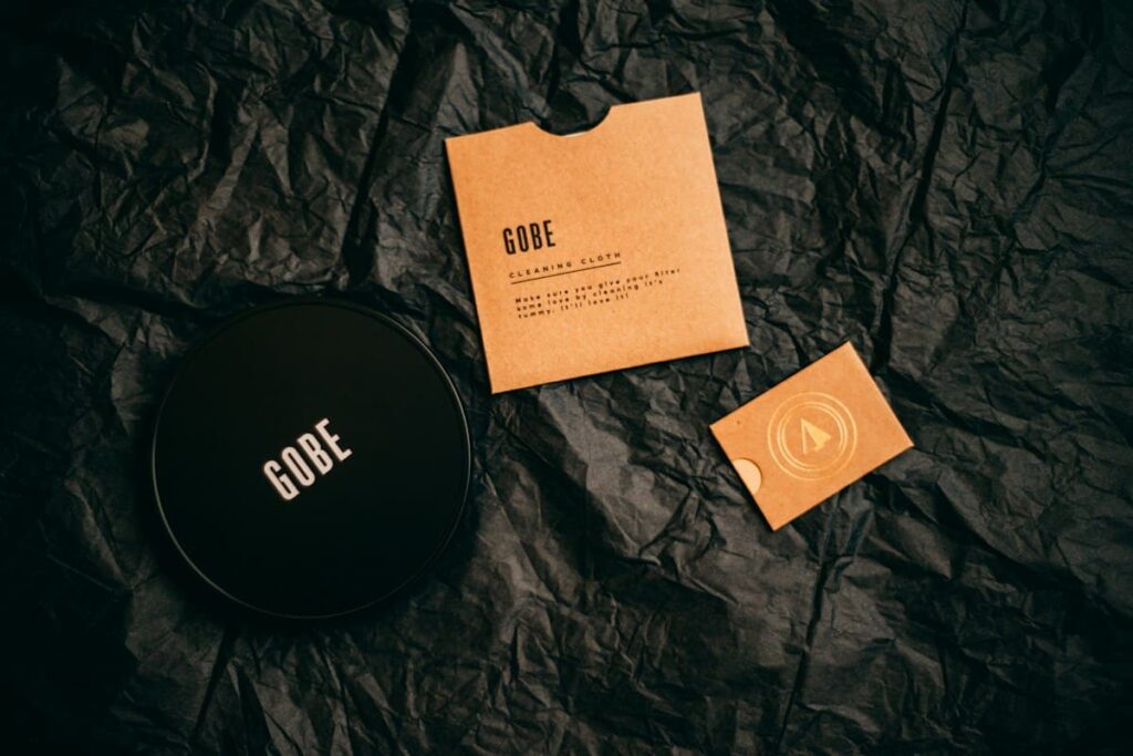 Small travel case and packets, representing packing condoms as a simple STD prevention step for travellers